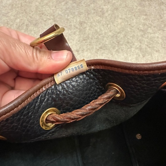 Vintage Dooney & Bourke Black w/Brown All Weather Leather Sling Small Backpack main image 5